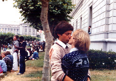 Young lovers kiss.