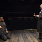 LaShawn Banks (Actor/Dying Man) and Marc Grapey (Robert Hooke) in ISAAC'S EYE at Writers Theatre.  Photo by Michael Brosilow.