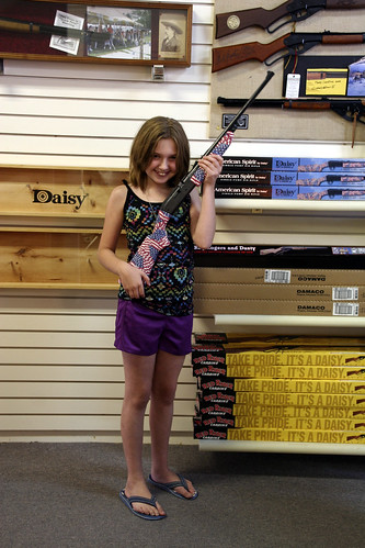 Girl with Independence BB gun - flag 1