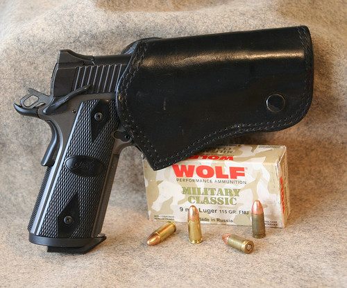 Gun in Ted Blocker CC holster w wolf ammo box