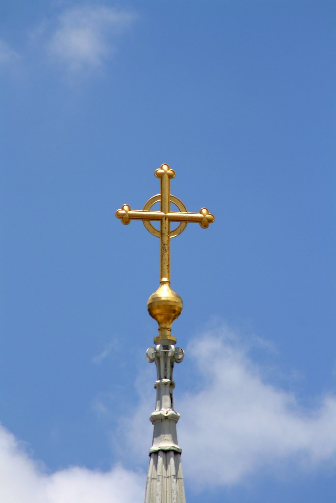 Golden Cross Pointing Upward