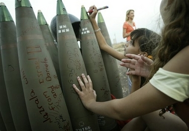 Israeli girls sign gifts for Lebanese