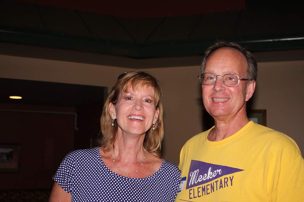 Jane Burkholder Walker (1975) and Ed Hendrickson (1974) IMG_4764 Fri 2015-07-31 Ames High School Ames Iowa 40-year 1975 class reunion Ames IA Ed wearing Meeker Elementary School shirt #AmesHighClassof1975 #AmesHighClassof1974