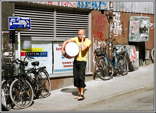 With a drum