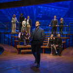 (Foreground) Thom Miller and (background) select members of the cast of COMPANY at Writers Theatre. Photo by Michael Brosilow.